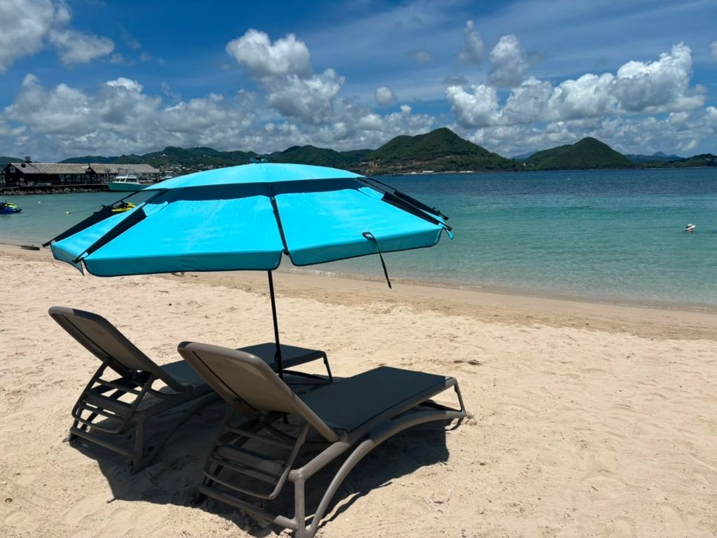 Pigeon Island Causeway Beach - 2 Beach Lounge Chair and an umbrella rentals