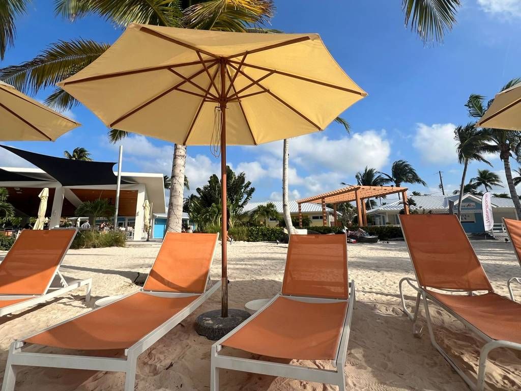 Rum Point Beach - 2 Beach Lounge Chair and an umbrella rentals