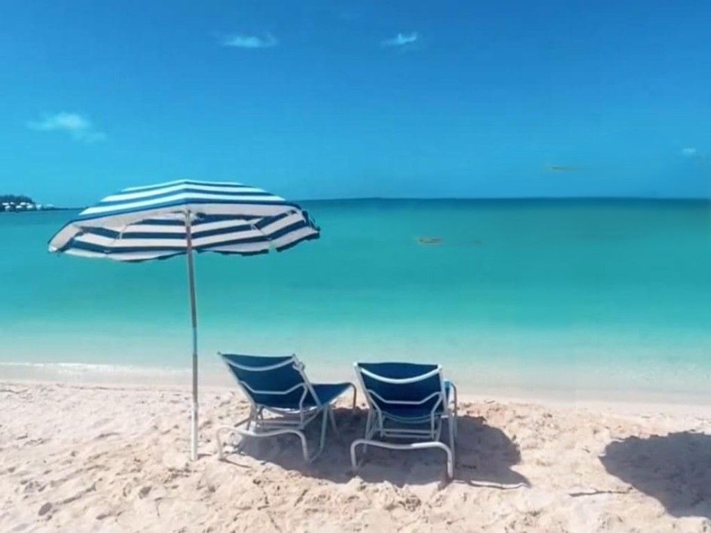 Somerset Long Bay Beach - 2 Beach Lounge Chair and an umbrella rentals